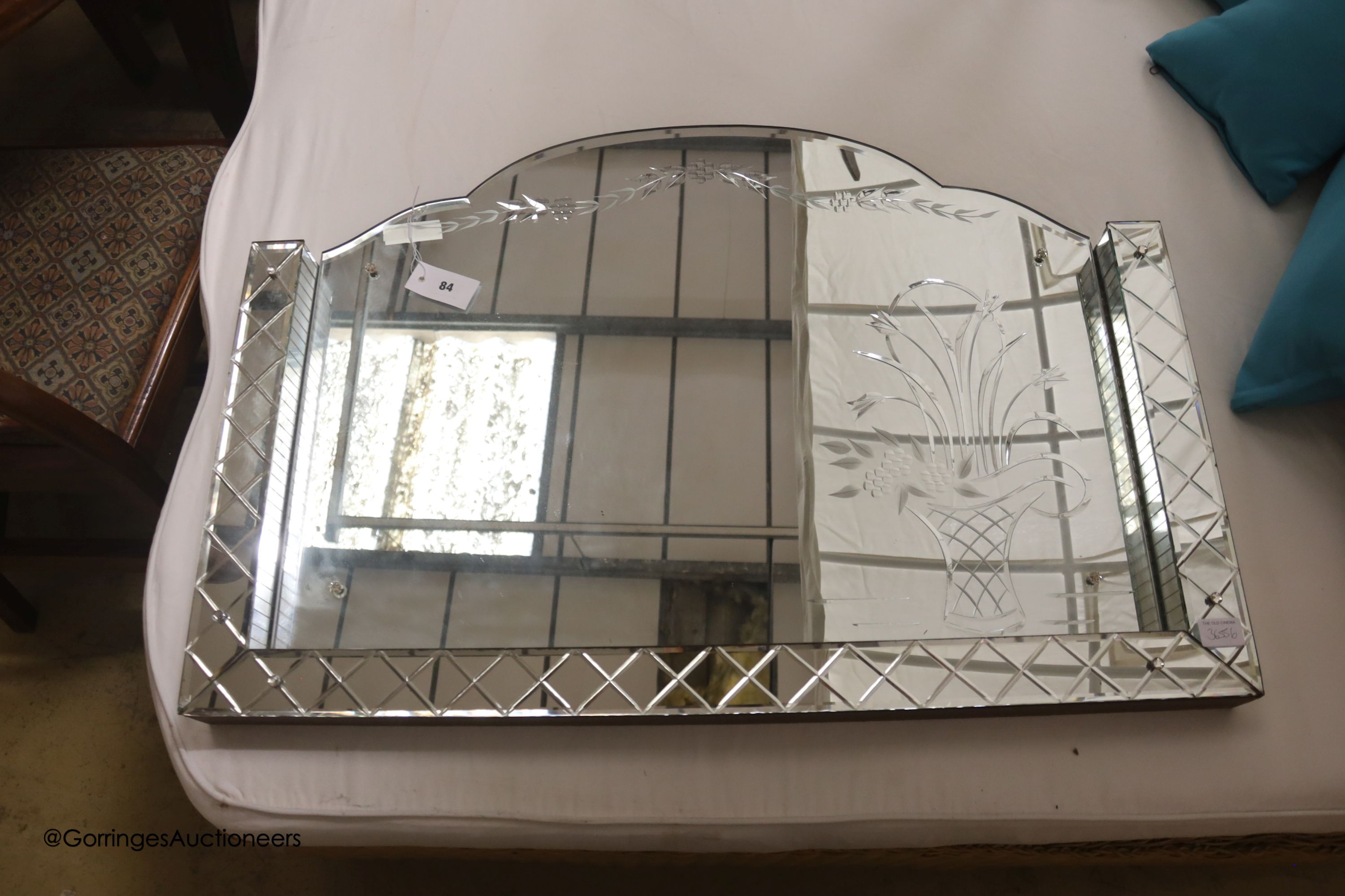 A Deco style engraved glass wall mirror, width 91cm, height 64cm